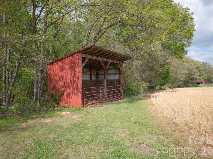 824 Forest Hills School Road, Marshville, NC 28103.  MLS# CAR4353815, YatesRealty ID 16088. Additional run-in shed