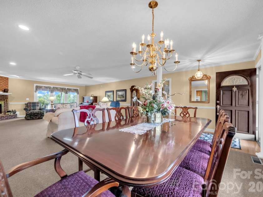824 Forest Hills School Road, Marshville, NC 28103.  MLS# CAR4353815, YatesRealty ID 16088. Dining area with columns and chair railing