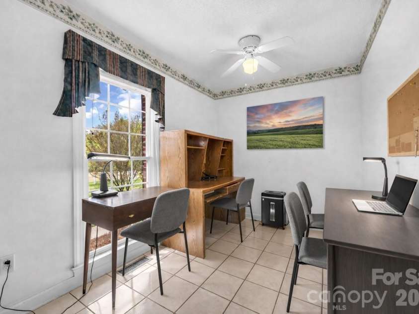 824 Forest Hills School Road, Marshville, NC 28103.  MLS# CAR4353815, YatesRealty ID 16088. Laundry room is also utilized as an office and could also accommodate a mud room