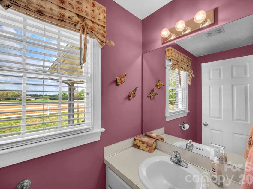 824 Forest Hills School Road, Marshville, NC 28103.  MLS# CAR4353815, YatesRealty ID 16088. Powder Bath
