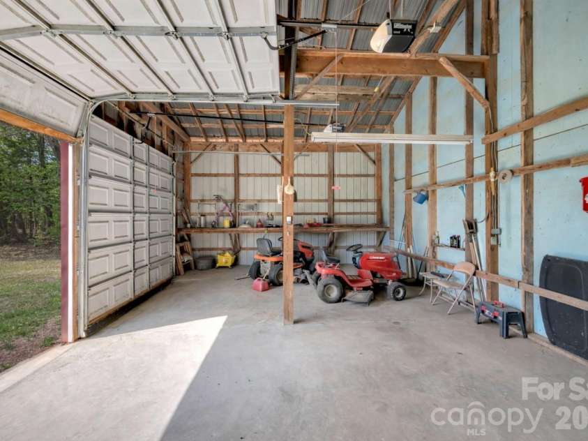 824 Forest Hills School Road, Marshville, NC 28103.  MLS# CAR4353815, YatesRealty ID 16088. Two automatic garage doors
