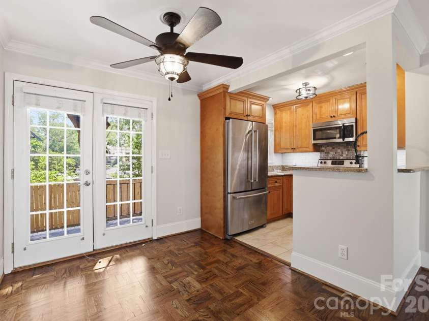 722 Franklin Street, Monroe, NC 28112.  MLS# CAR4346829, YatesRealty ID 16090. Dining Area with Doors to back yard722 W Franklin StMonroe, NC 28112