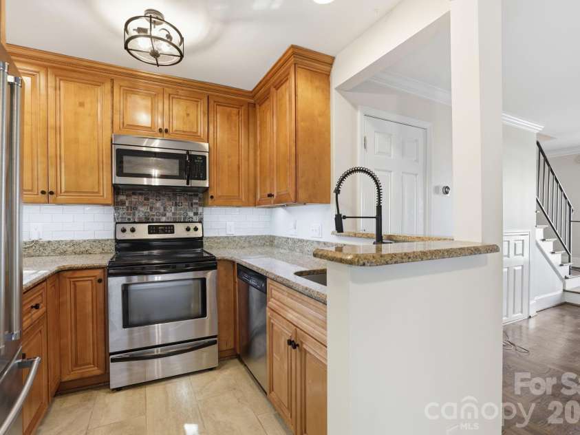 722 Franklin Street, Monroe, NC 28112.  MLS# CAR4346829, YatesRealty ID 16090. Kitchen with Granite Countertops722 W Franklin StMonroe, NC 28112