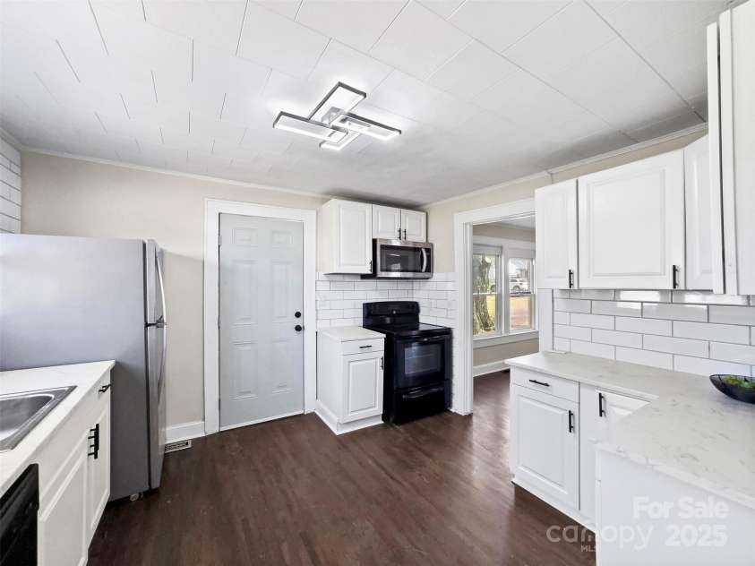 420 Coggins Avenue, Albemarle, NC 28001.  MLS# CAR4239832, YatesRealty ID 16093. 