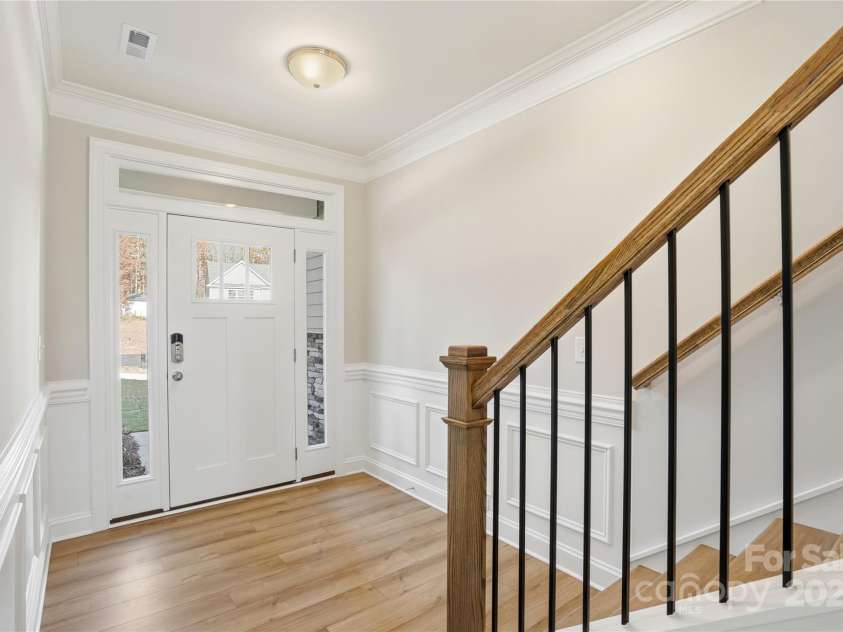 6027 Veld Court, Charlotte, NC 28215.  MLS# CAR4257024, YatesRealty ID 16096. Foyer with wainscoting