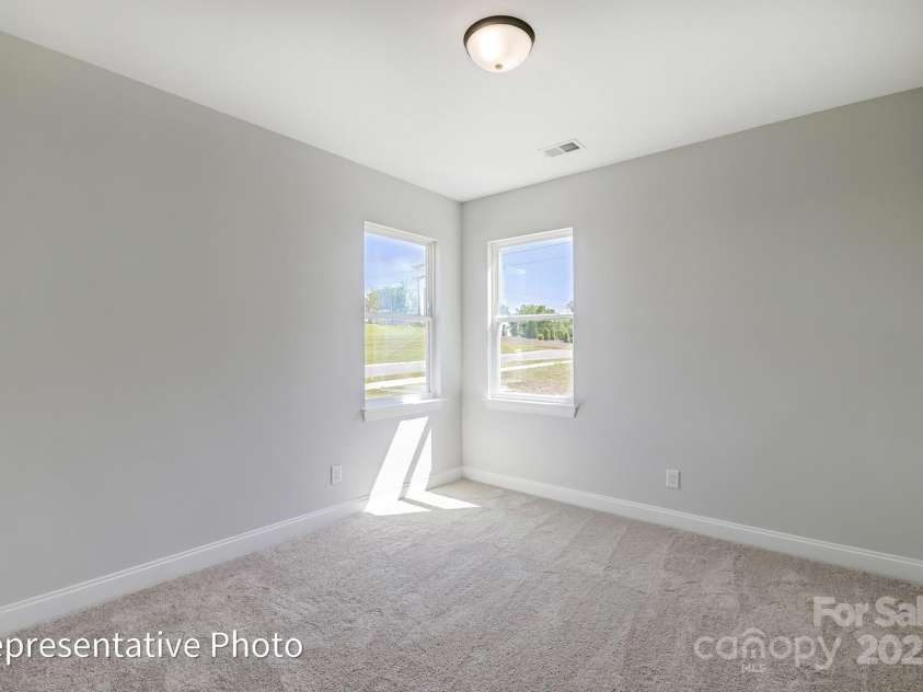 6027 Veld Court, Charlotte, NC 28215.  MLS# CAR4257024, YatesRealty ID 16096. Guest Bedroom on main