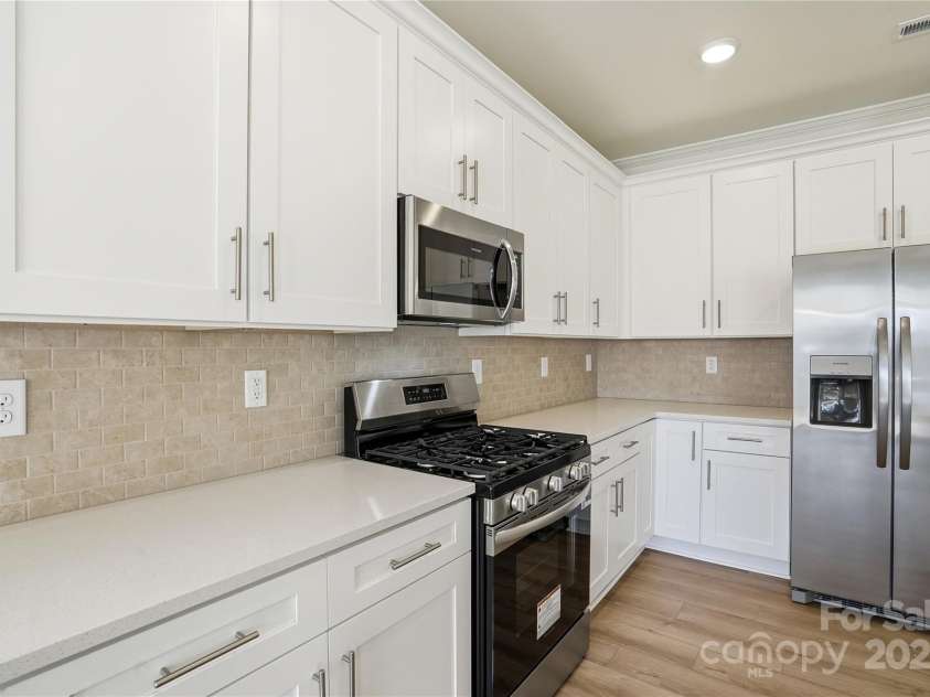 6027 Veld Court, Charlotte, NC 28215.  MLS# CAR4257024, YatesRealty ID 16096. Kitchen with refrigerator included