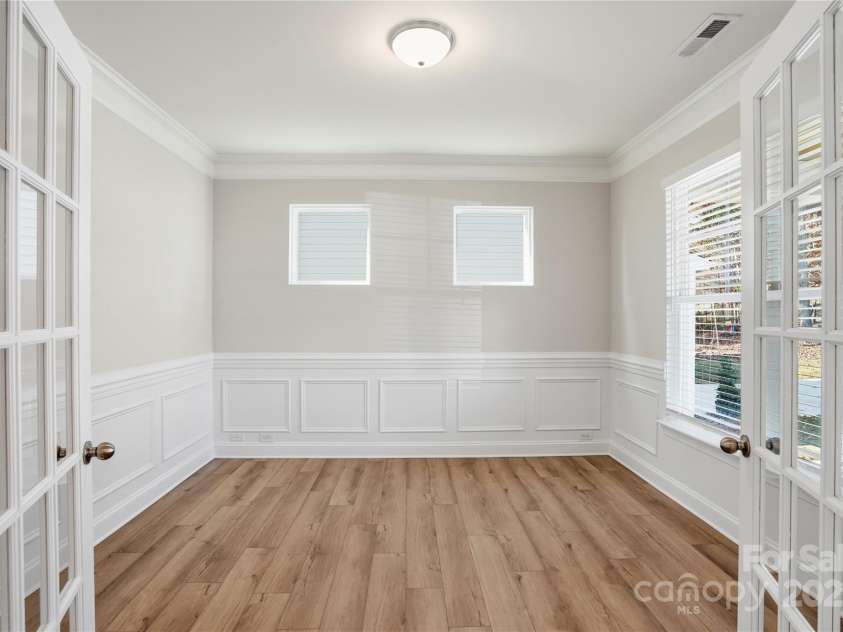 6027 Veld Court, Charlotte, NC 28215.  MLS# CAR4257024, YatesRealty ID 16096. Office with French doors & wainscoting