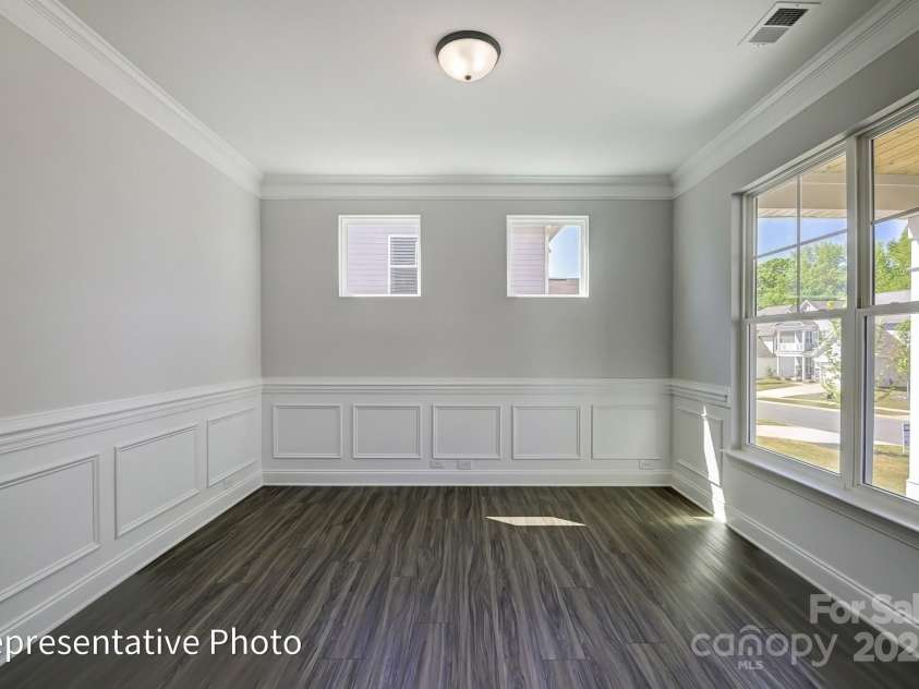 6027 Veld Court, Charlotte, NC 28215.  MLS# CAR4257024, YatesRealty ID 16096. Study has been selected ilo dining room