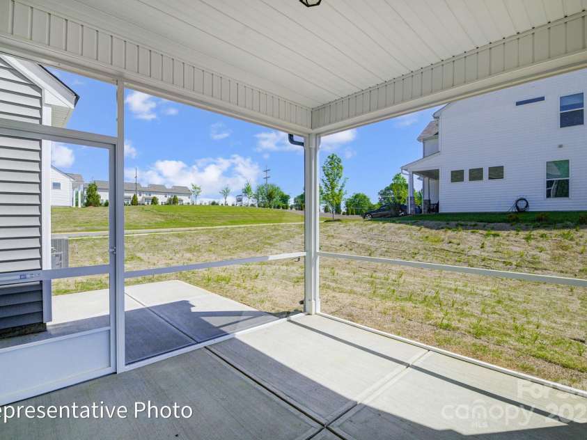6027 Veld Court, Charlotte, NC 28215.  MLS# CAR4257024, YatesRealty ID 16096. This home features a screen porch