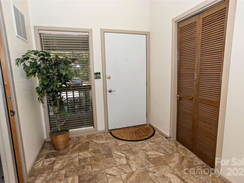 156 West Lake Drive, Lake Lure, NC 28746.  MLS# CAR4312883, YatesRealty ID 16099. 