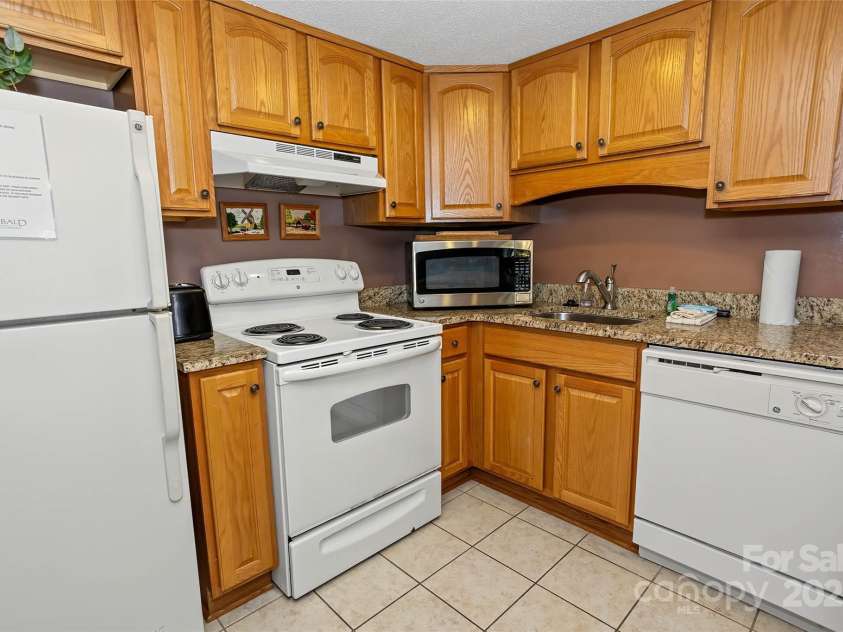 156 West Lake Drive, Lake Lure, NC 28746.  MLS# CAR4312883, YatesRealty ID 16099. 