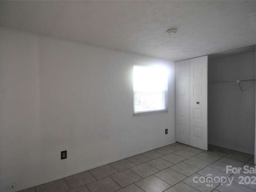 9432-D Lexington Circle, Charlotte, NC 28213.  MLS# CAR4332277, YatesRealty ID 1610. 1st bedroom upstairs