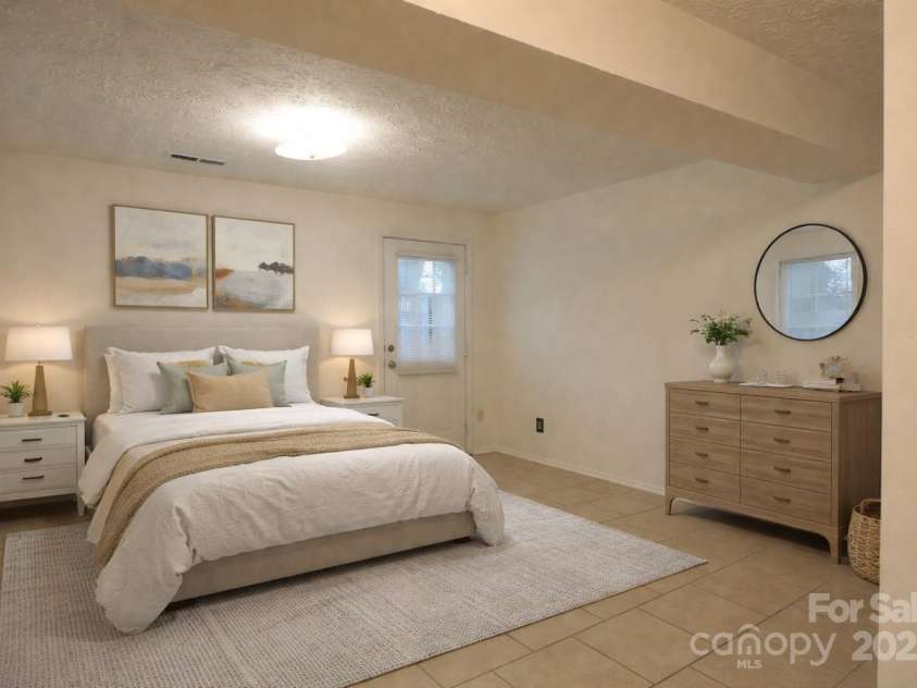 9432-D Lexington Circle, Charlotte, NC 28213.  MLS# CAR4332277, YatesRealty ID 1610. Basement primary staged