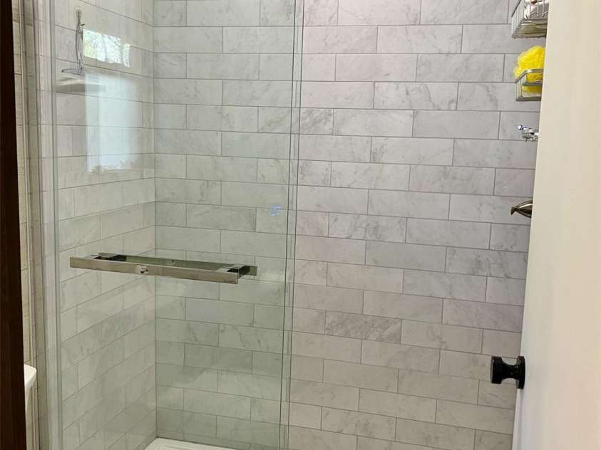 102 Lake Drive, Lake Lure, NC 28746.  MLS# CAR4245174, YatesRealty ID 16100. Beautiful walk in shower