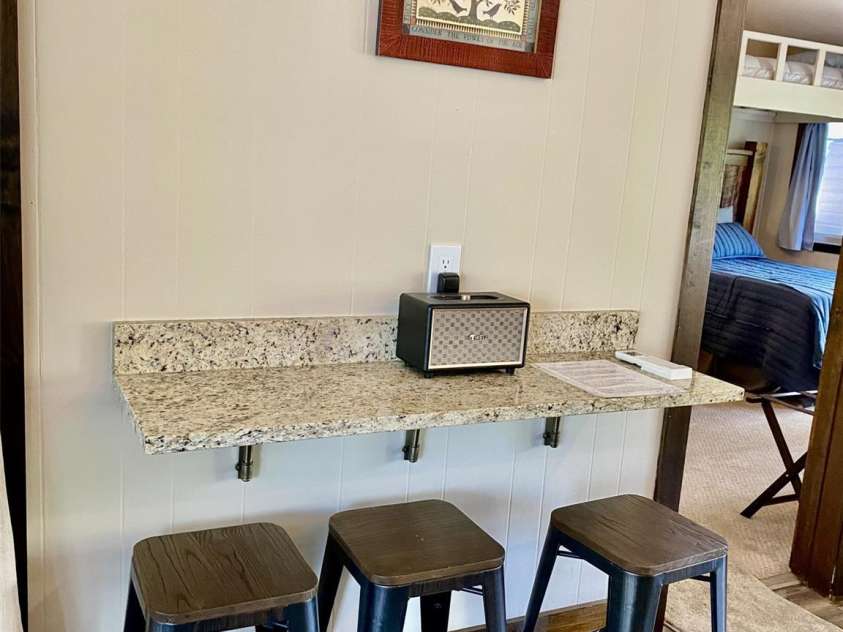 102 Lake Drive, Lake Lure, NC 28746.  MLS# CAR4245174, YatesRealty ID 16100. Extra seating in kitchen