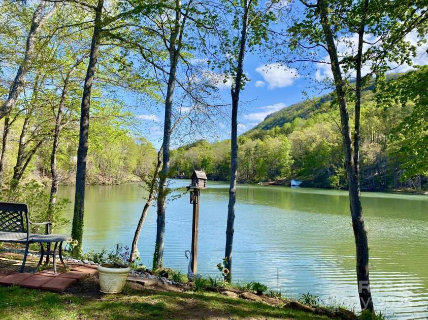 102 Lake Drive, Lake Lure, NC 28746.  MLS# CAR4245174, YatesRealty ID 16100. Incredible views of Youngs Mt and Bald MT Lake