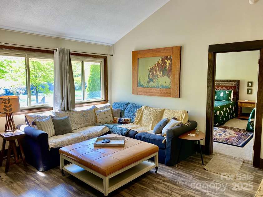102 Lake Drive, Lake Lure, NC 28746.  MLS# CAR4245174, YatesRealty ID 16100. Sectional couch allows for lots of seating