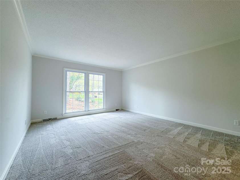 12011 Stoney Meadow Drive, Mint Hill, NC 28227.  MLS# CAR4240871, YatesRealty ID 16104. Formal Living/Office with pocket doors