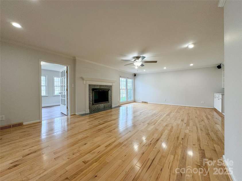12011 Stoney Meadow Drive, Mint Hill, NC 28227.  MLS# CAR4240871, YatesRealty ID 16104. Living Room with Gas Fireplace and surround sound