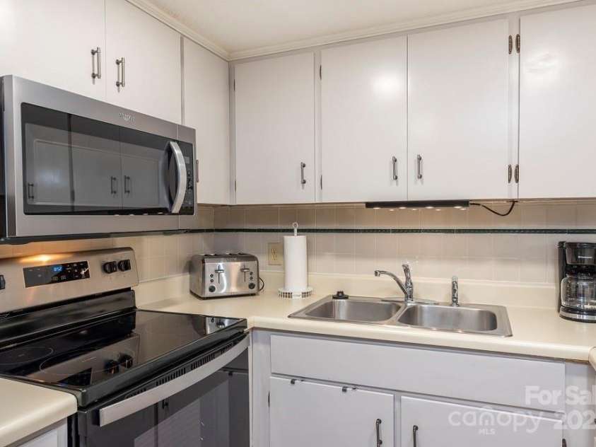 126 Hillside Court, Lake Lure, NC 28746.  MLS# CAR4237245, YatesRealty ID 16106. 