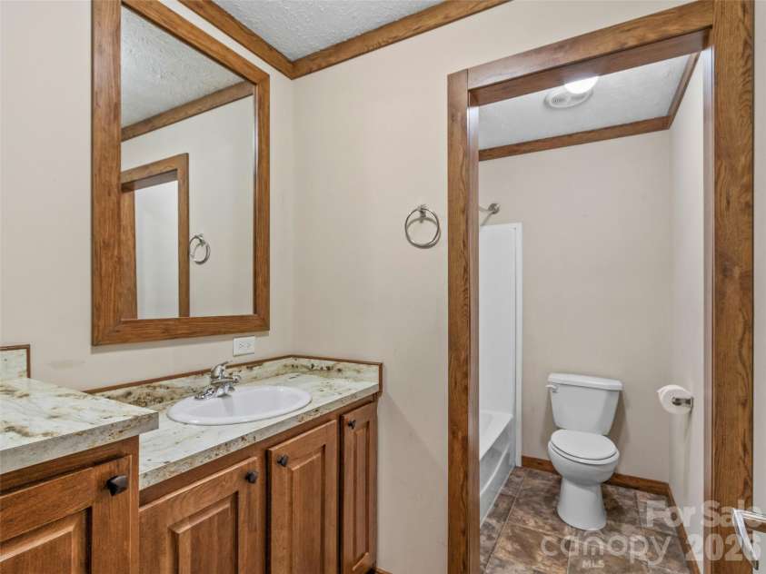 695 Johnson Farm Road, Canton, NC 28716.  MLS# CAR4359837, YatesRealty ID 16107. 2nd Bath 
