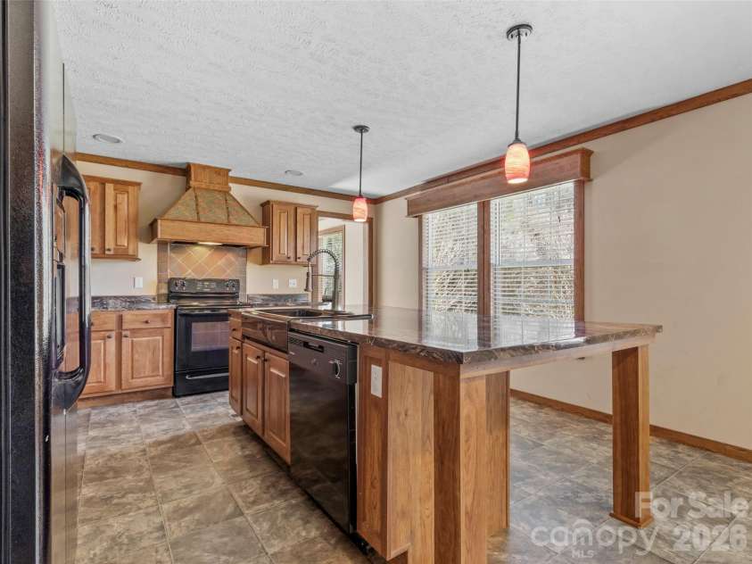 695 Johnson Farm Road, Canton, NC 28716.  MLS# CAR4359837, YatesRealty ID 16107. 
