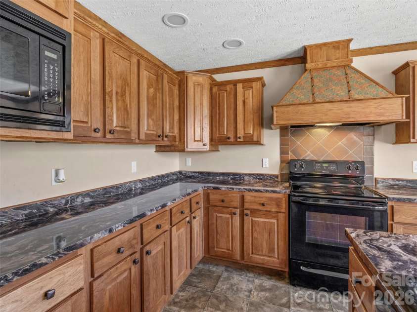 695 Johnson Farm Road, Canton, NC 28716.  MLS# CAR4359837, YatesRealty ID 16107. 