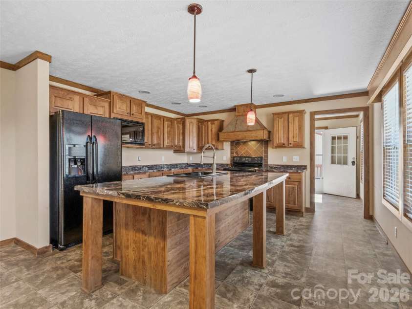 695 Johnson Farm Road, Canton, NC 28716.  MLS# CAR4359837, YatesRealty ID 16107. Kitchen 