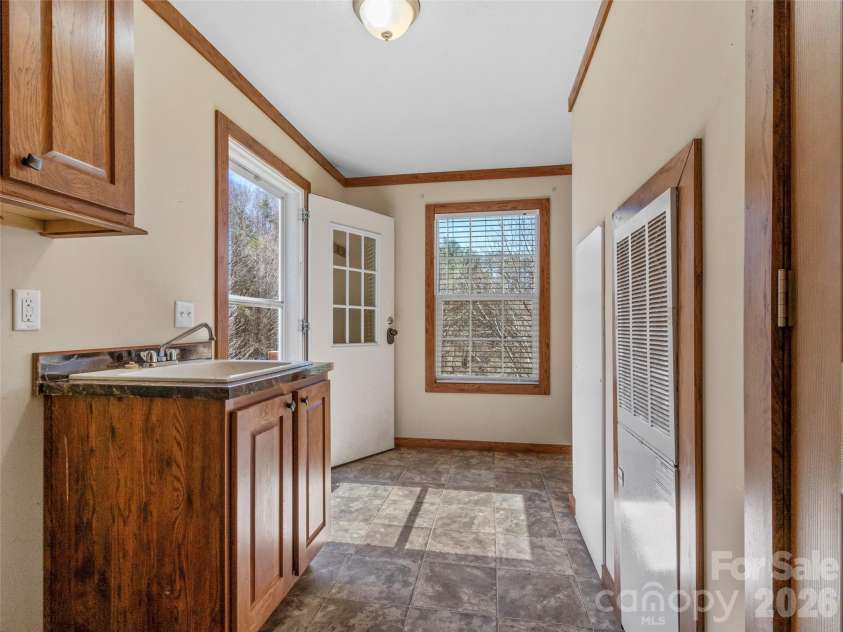 695 Johnson Farm Road, Canton, NC 28716.  MLS# CAR4359837, YatesRealty ID 16107. Utility Room