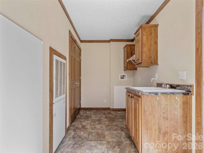 695 Johnson Farm Road, Canton, NC 28716.  MLS# CAR4359837, YatesRealty ID 16107. Utility Room 