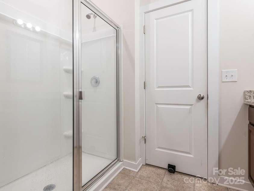 805 Old Little Rock Road, Charlotte, NC 28214.  MLS# CAR4259723, YatesRealty ID 16107. Main level primary bathroom