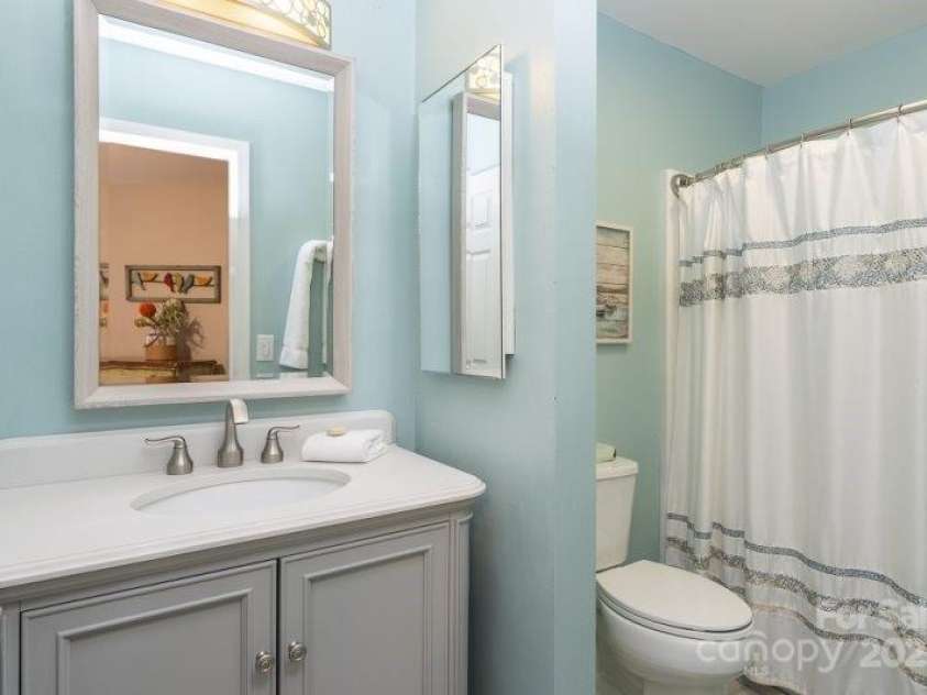 147 Lake Drive, Lake Lure, NC 28746.  MLS# CAR4221917, YatesRealty ID 16111. 