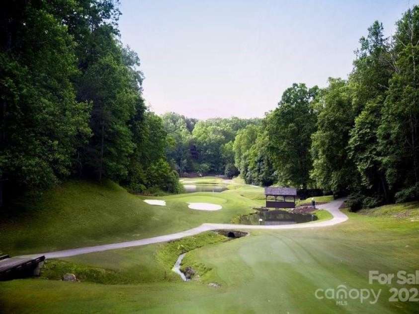 147 Lake Drive, Lake Lure, NC 28746.  MLS# CAR4221917, YatesRealty ID 16111. 