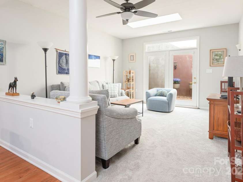121 Shadowbrook Drive, Asheville, NC 28805.  MLS# CAR4243178, YatesRealty ID 16112. Living Room with Skylights
