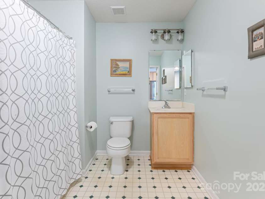 121 Shadowbrook Drive, Asheville, NC 28805.  MLS# CAR4243178, YatesRealty ID 16112. Main Bathroom with wide door and turnaround