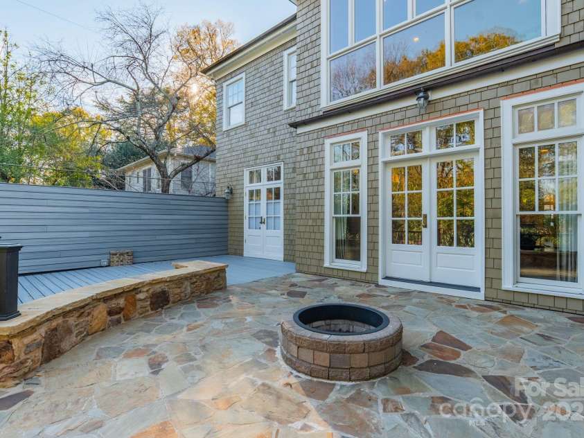1333 Carlton Avenue, Charlotte, NC 28203.  MLS# CAR4211721, YatesRealty ID 16118. Back Stone Patio w/New Trex Deck & Privacy Wall