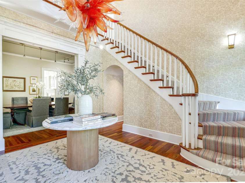 1333 Carlton Avenue, Charlotte, NC 28203.  MLS# CAR4211721, YatesRealty ID 16118. Front Foyer w/Chihuly-like Hand Blown Glass Light Fixture
