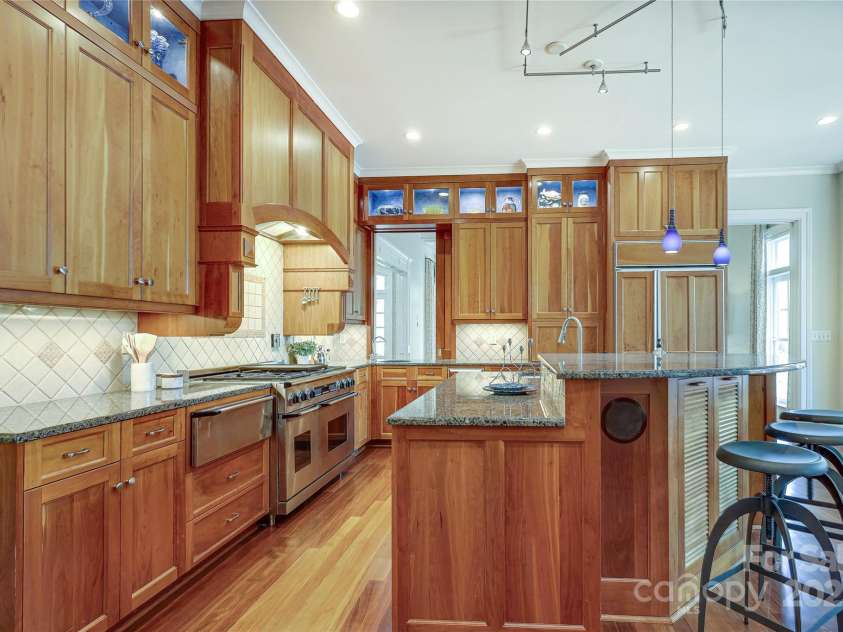 1333 Carlton Avenue, Charlotte, NC 28203.  MLS# CAR4211721, YatesRealty ID 16118. Kitchen opening to Formal Living Room