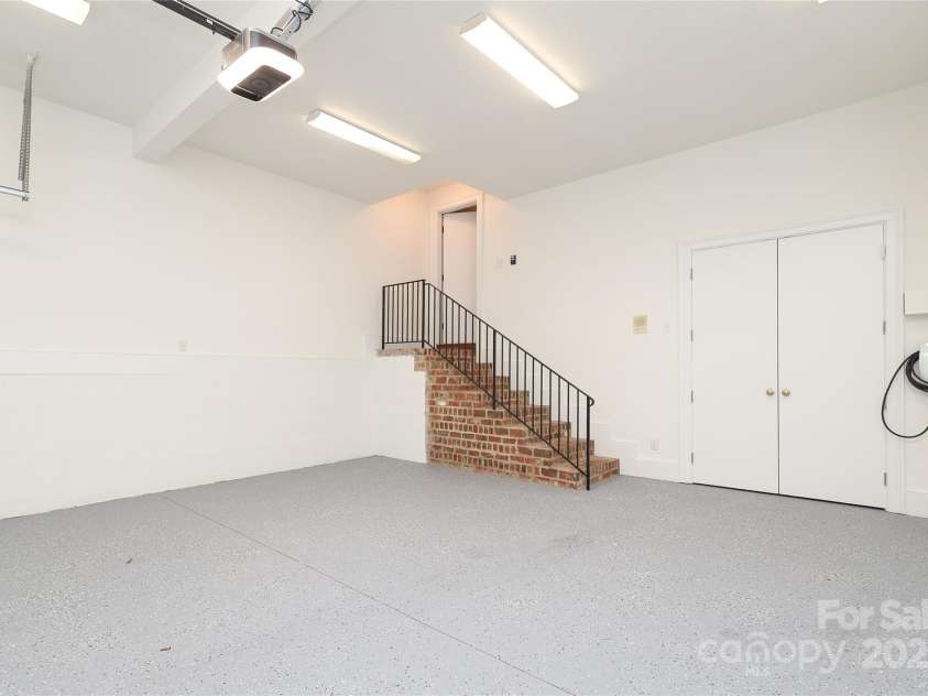 1333 Carlton Avenue, Charlotte, NC 28203.  MLS# CAR4211721, YatesRealty ID 16118. Oversized, two-car garage w/Tesla Charger