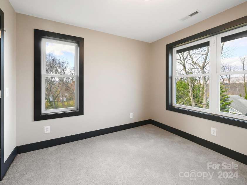 52 Fox Drive, Asheville, NC 28803.  MLS# CAR4201409, YatesRealty ID 16120. 3rd Bedroom with mountain views