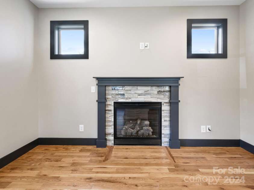 52 Fox Drive, Asheville, NC 28803.  MLS# CAR4201409, YatesRealty ID 16120. Beautiful fireplace surround