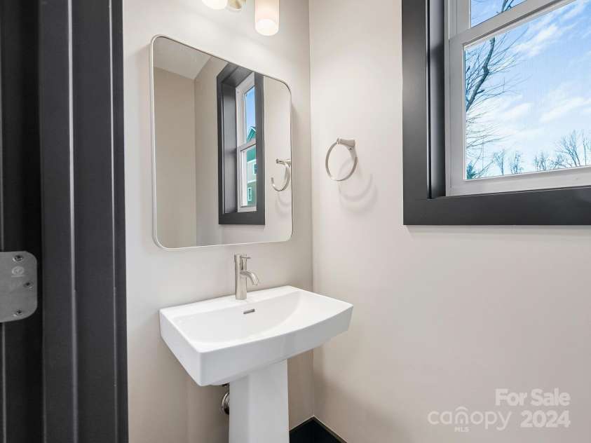 52 Fox Drive, Asheville, NC 28803.  MLS# CAR4201409, YatesRealty ID 16120. Half Bathroom on Main Level