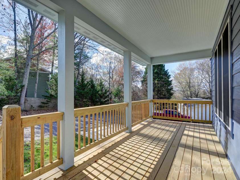 52 Fox Drive, Asheville, NC 28803.  MLS# CAR4201409, YatesRealty ID 16120. Relax on this Covered Front Porch