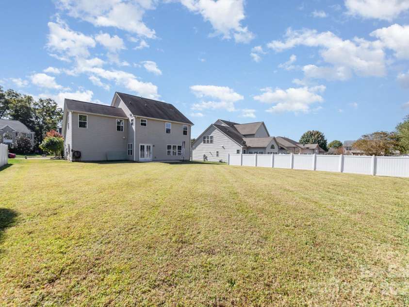 2677 Kinsley Avenue, Concord, NC 28027.  MLS# CAR4312032, YatesRealty ID 16121. Flat backyard 