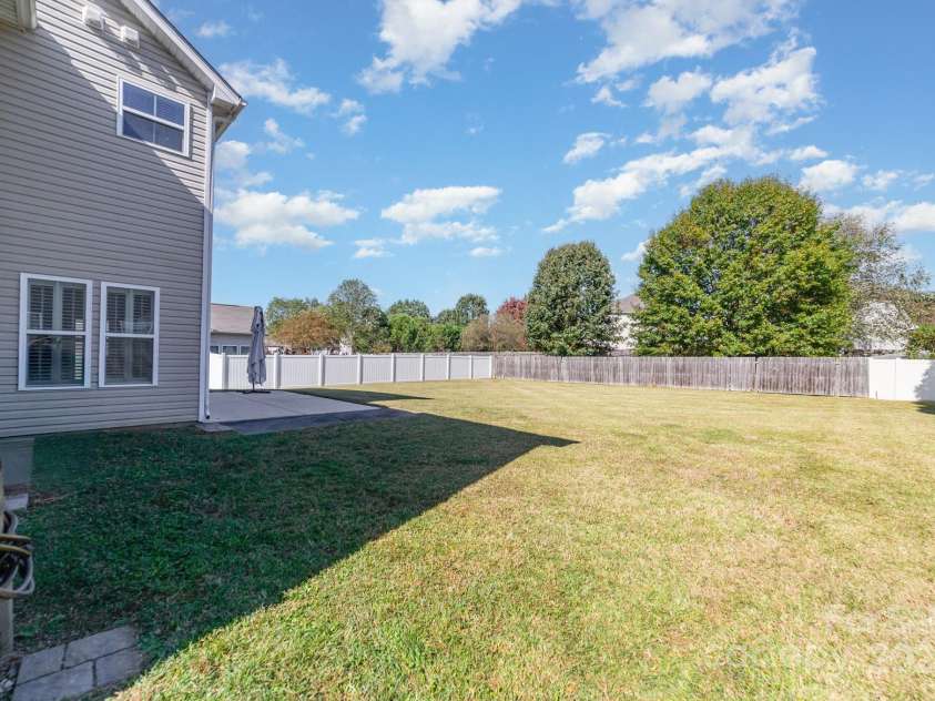 2677 Kinsley Avenue, Concord, NC 28027.  MLS# CAR4312032, YatesRealty ID 16121. Flat backyard 