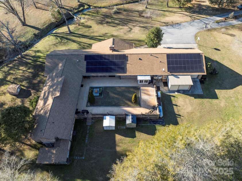 481 Kelly Lane, Pisgah Forest, NC 28768.  MLS# CAR4208992, YatesRealty ID 16121. Solar panels. The home never lost power during Hurricane Helene.