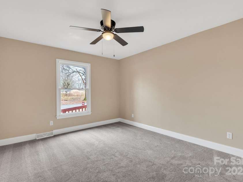 407 Thomas Street, Marshville, NC 28103.  MLS# CAR4216955, YatesRealty ID 16127. Large second bedroom