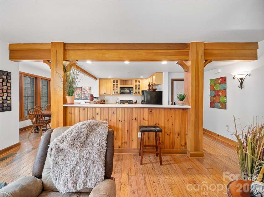 81 Creekside Way, Burnsville, NC 28714.  MLS# CAR4374251, YatesRealty ID 16129. Bar with extra dining bar stools