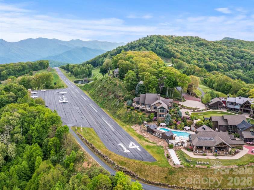 81 Creekside Way, Burnsville, NC 28714.  MLS# CAR4374251, YatesRealty ID 16129. Highest Private Runway in the East